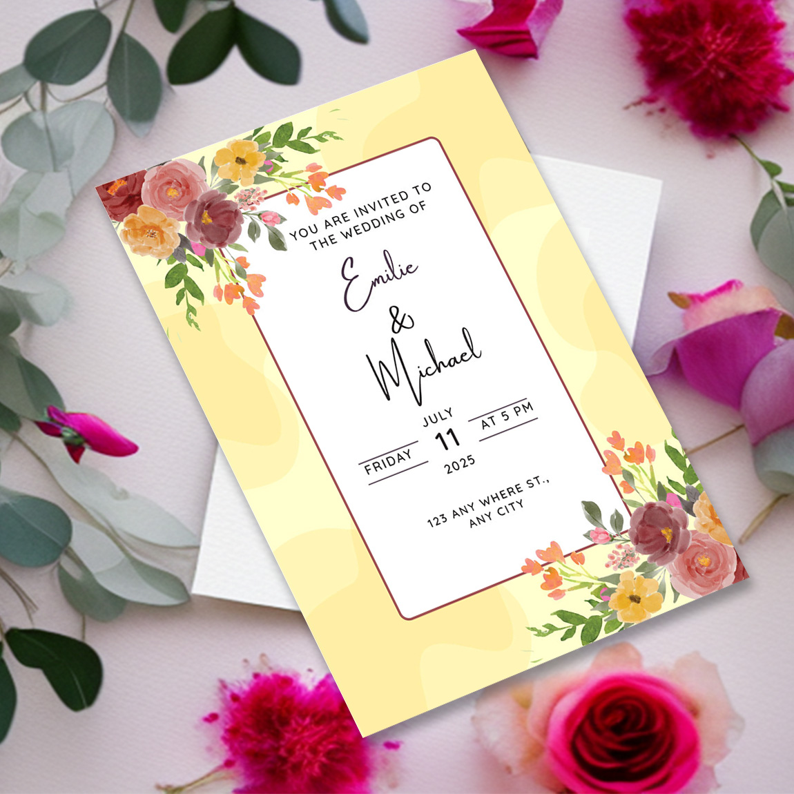 Image of colorful wedding invitation with floral design.