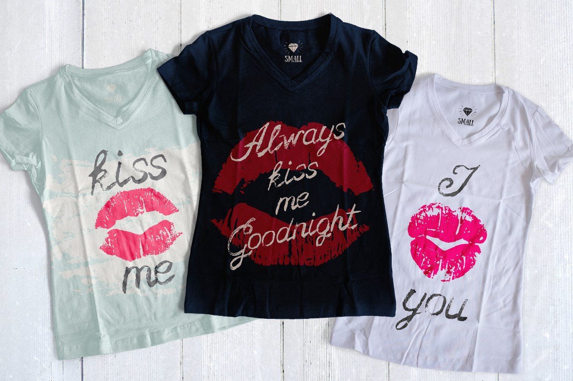 3 gray and black t-shirts with lettering and kises lips illustrations.