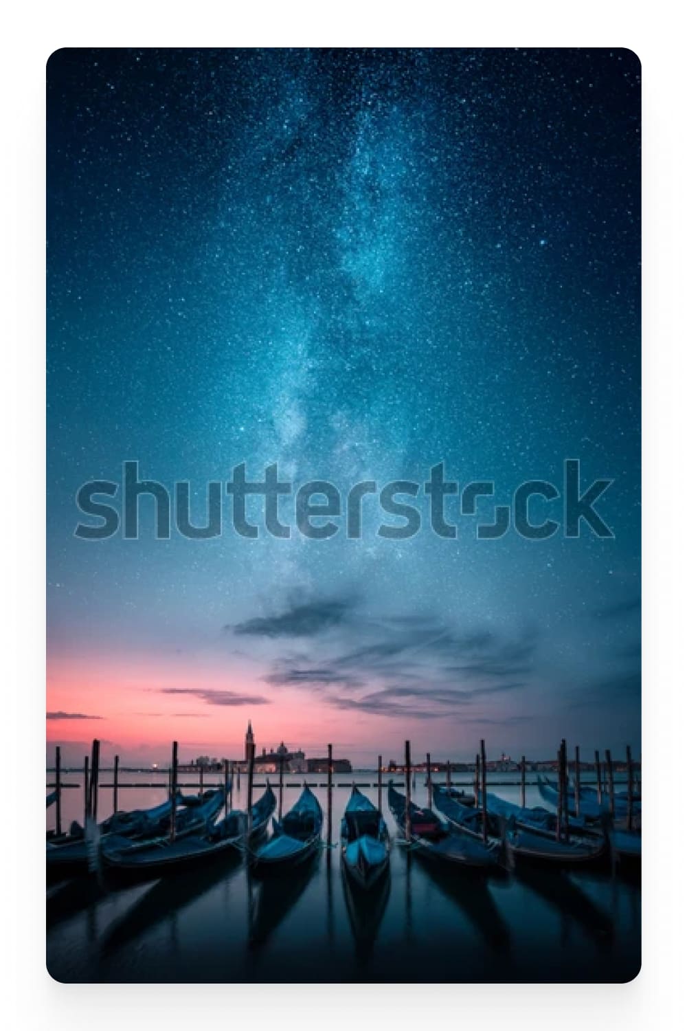 Photo of gondolas laid up in Venice and the starry sky.