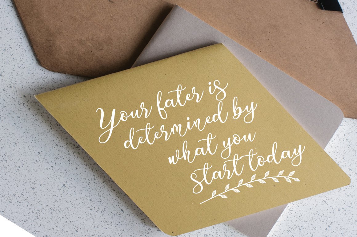 Beige card with white calligraphy quote.
