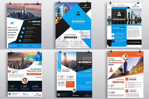 Some flyers with geometrics and blue and orange blocks.