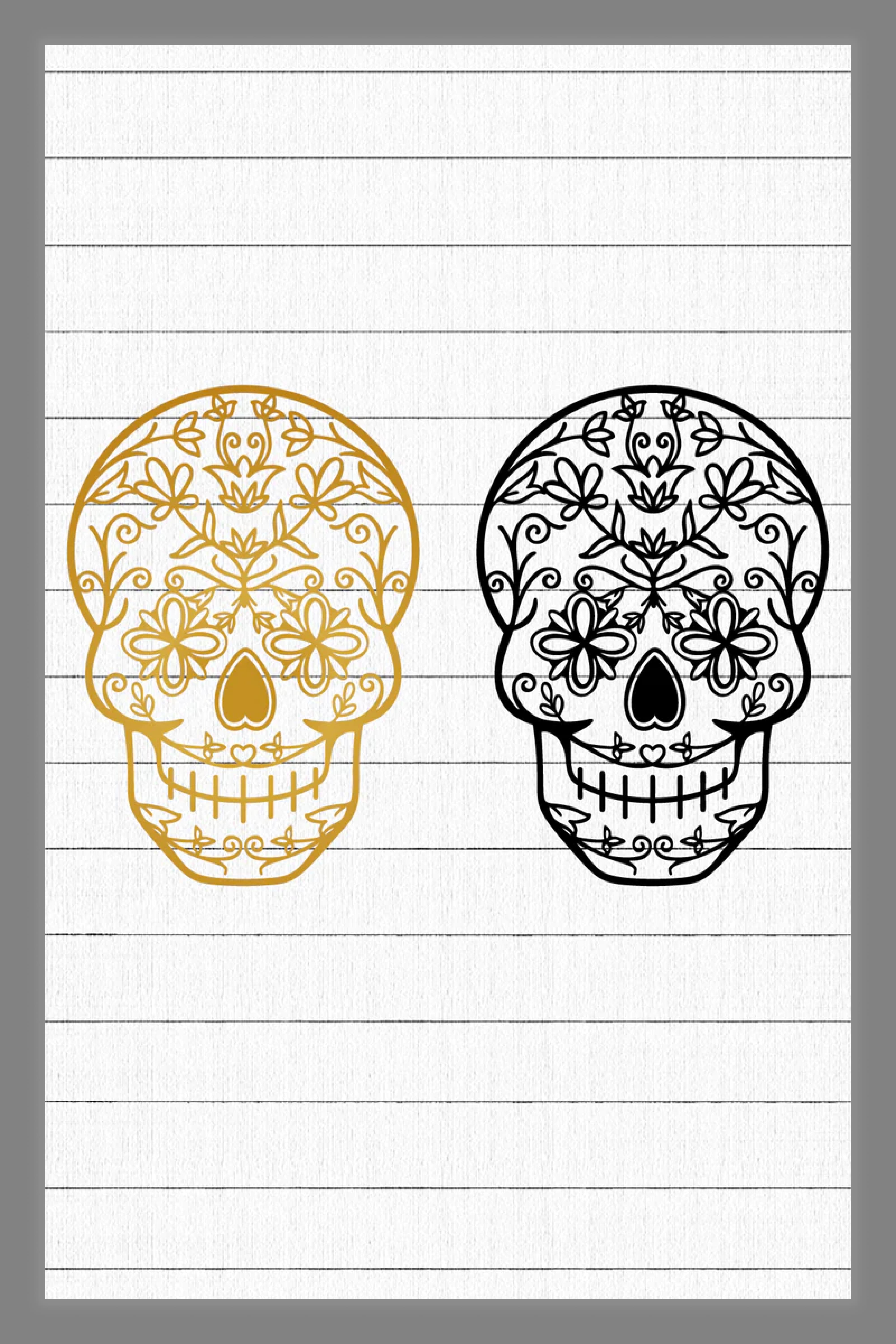 Two skulls in yellow and black with patterns on them.
