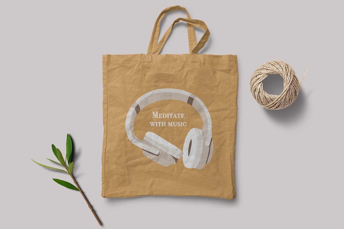Beige shopping bag with white quote and white headphones on a gray background.
