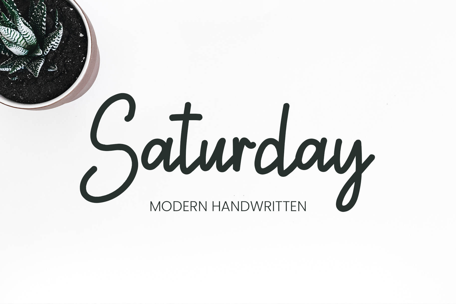 Saturday lettering by this cool cursive font.