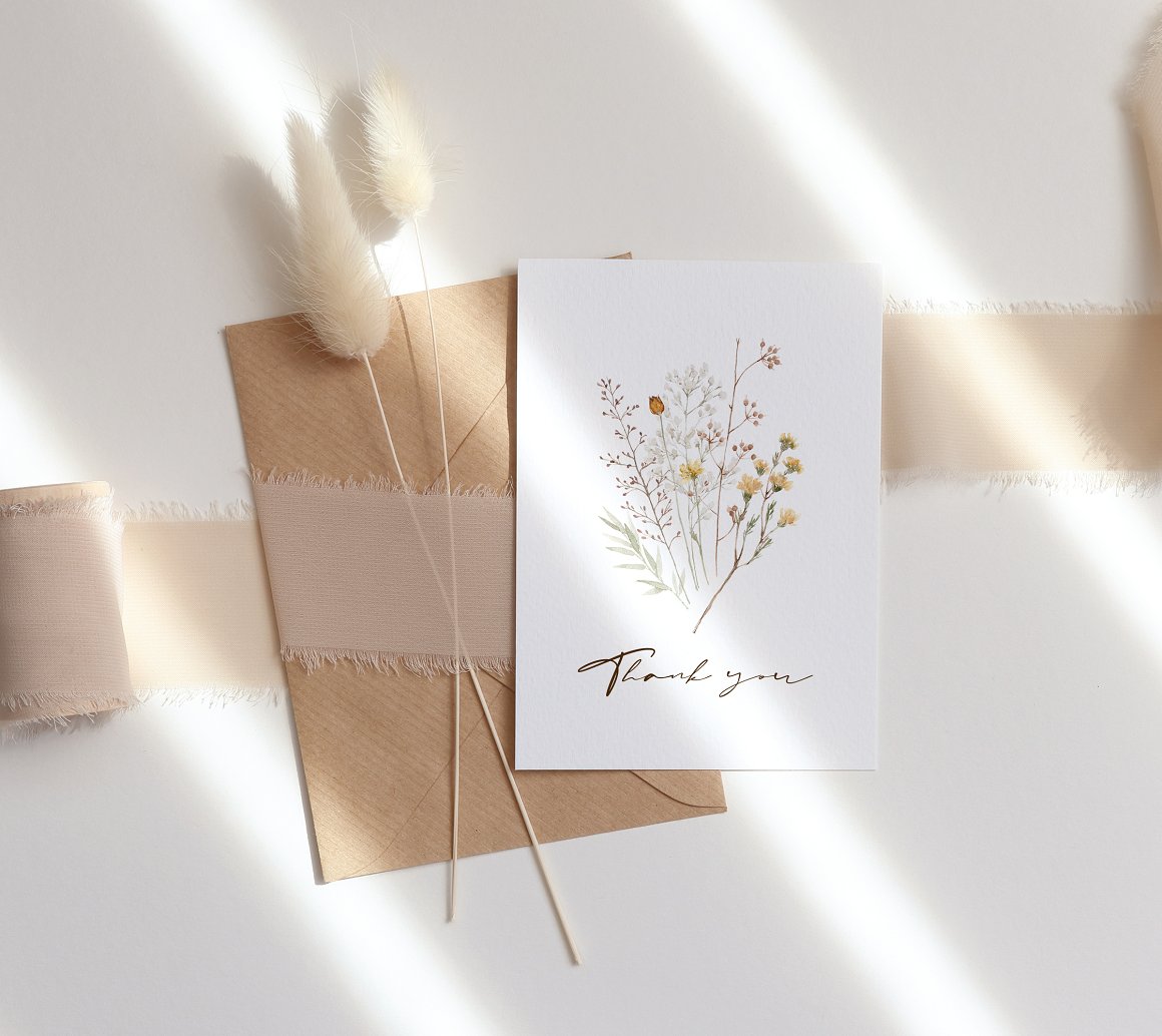 White card with lettering "Thank you" and floral illustration.