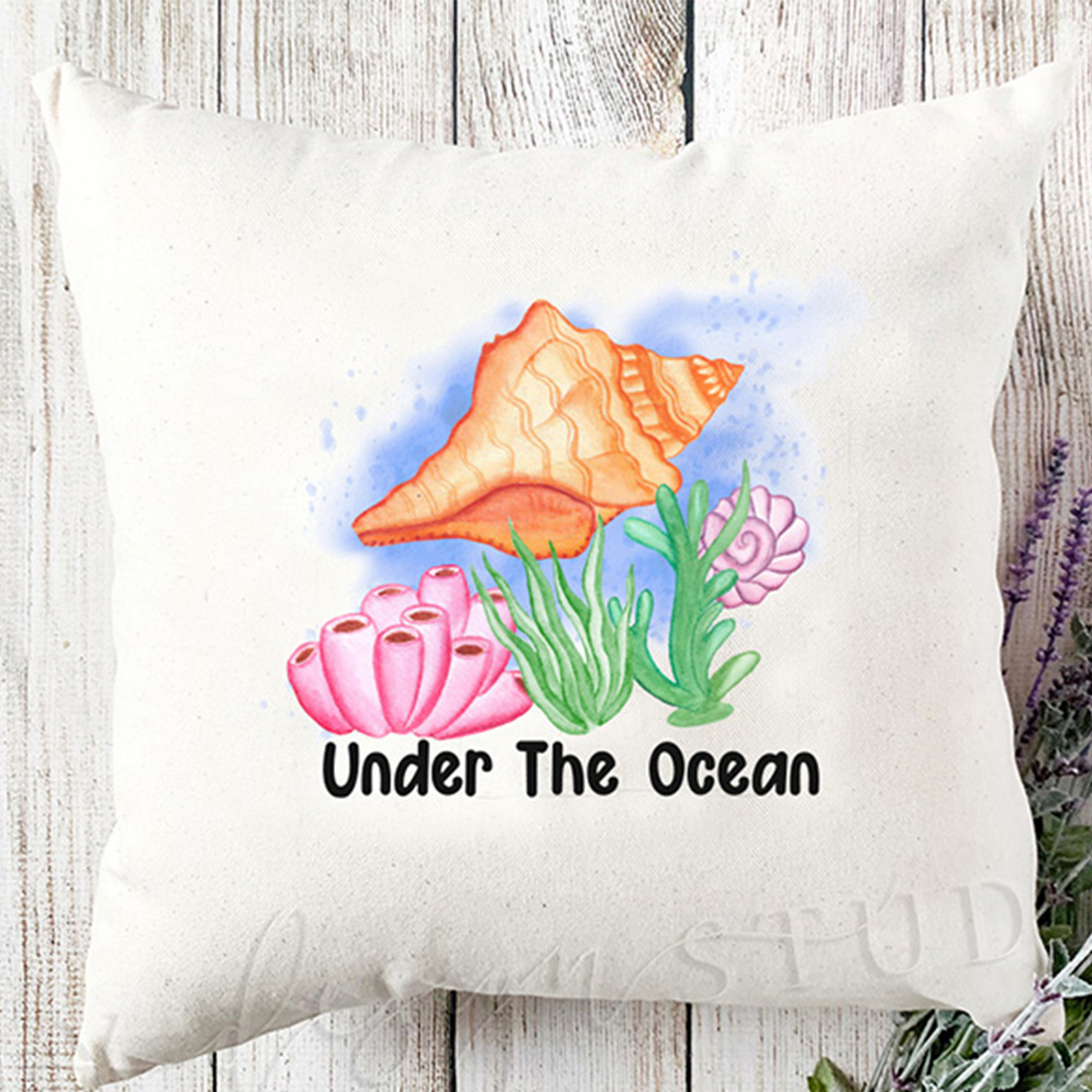 Under the ocean illustration on a pillow.