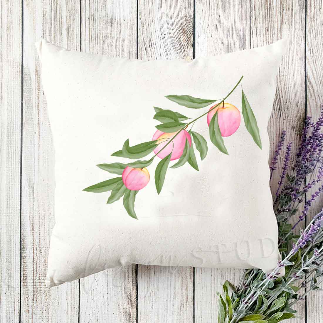 White pillow with the peach branch.