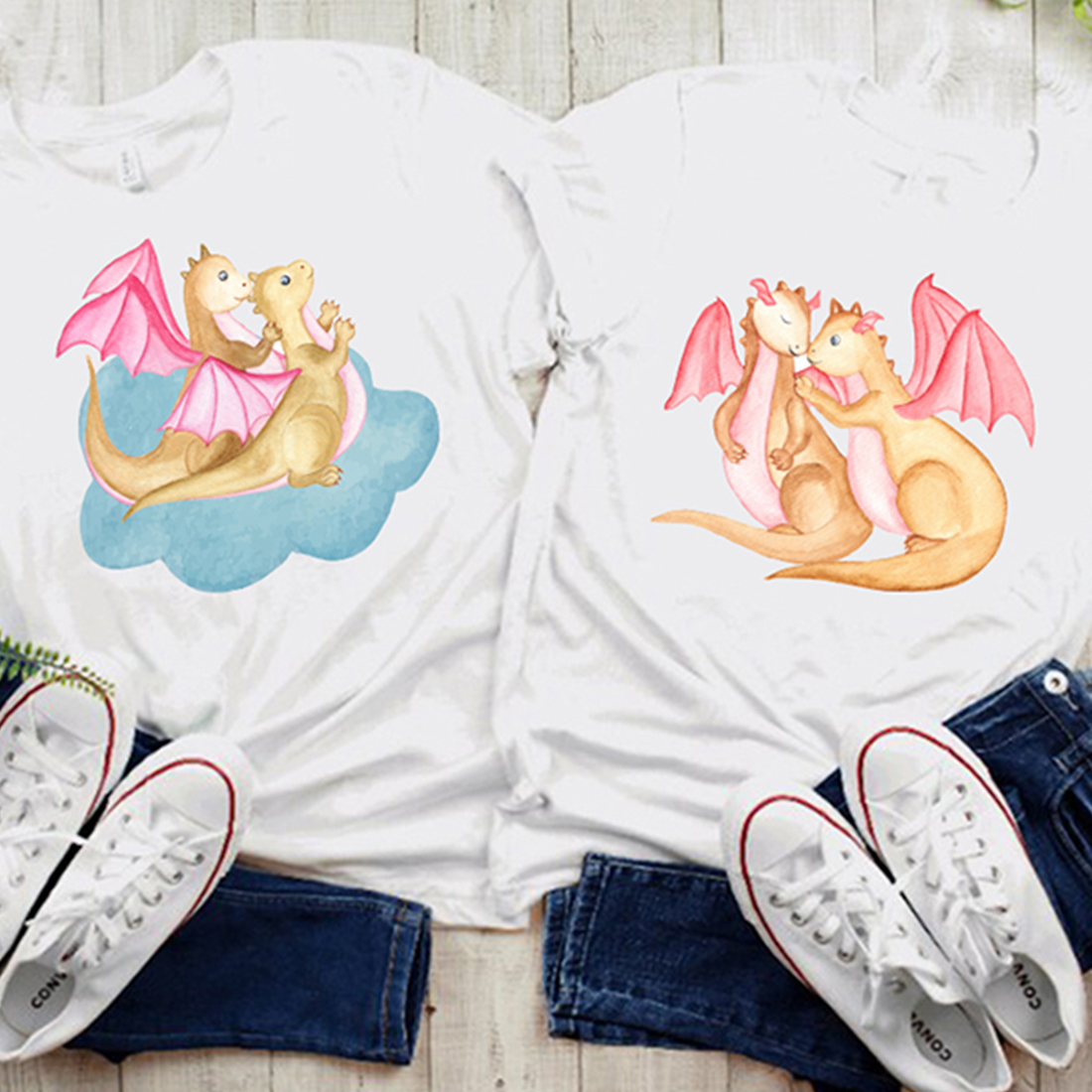 White t-shirts with cute dragons graphics.