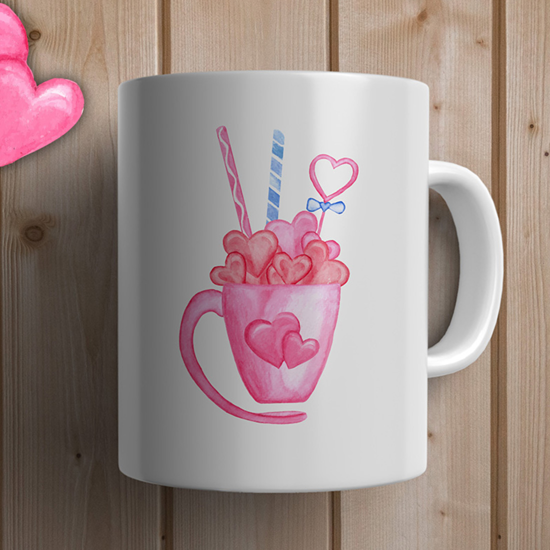 White cup with pink mug and sweets.