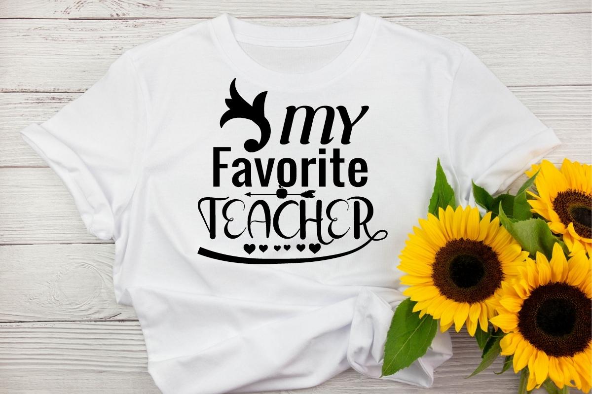 Simple white t-shirt with teacher lettering.