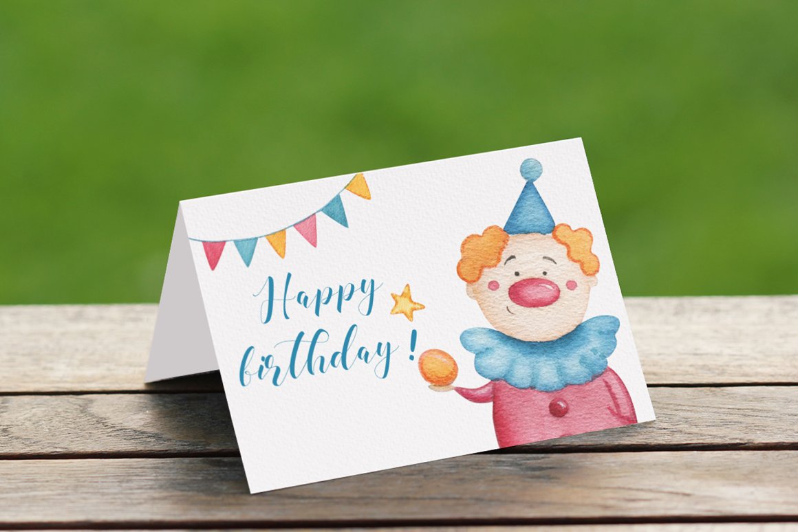 White card with blue lettering "Happy Birthday!" and illustrations of clown.