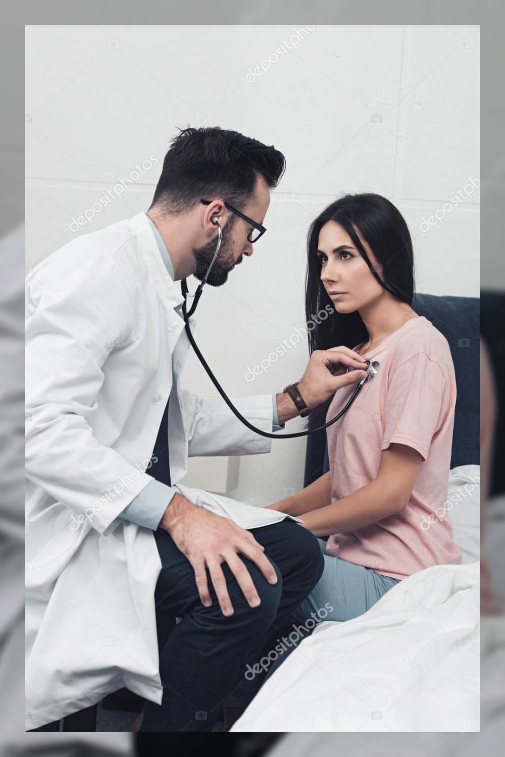 Confident young doctor listening breath of female patient.