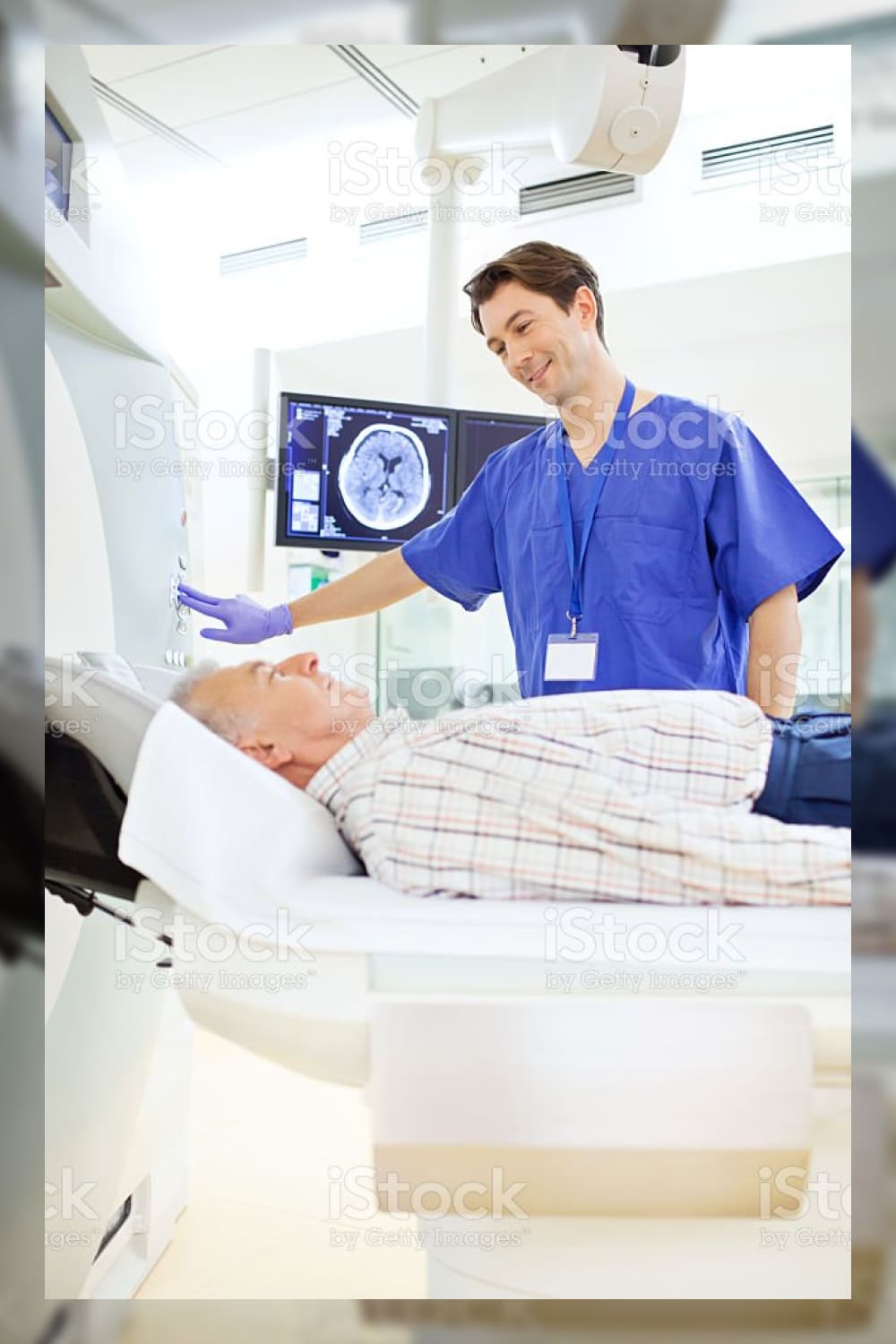 Patient at a computer tomography exam stock photo.