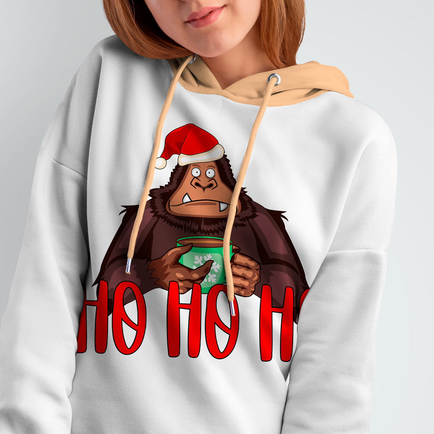 Woman wearing a sweatshirt with a christmas monkey on it.
