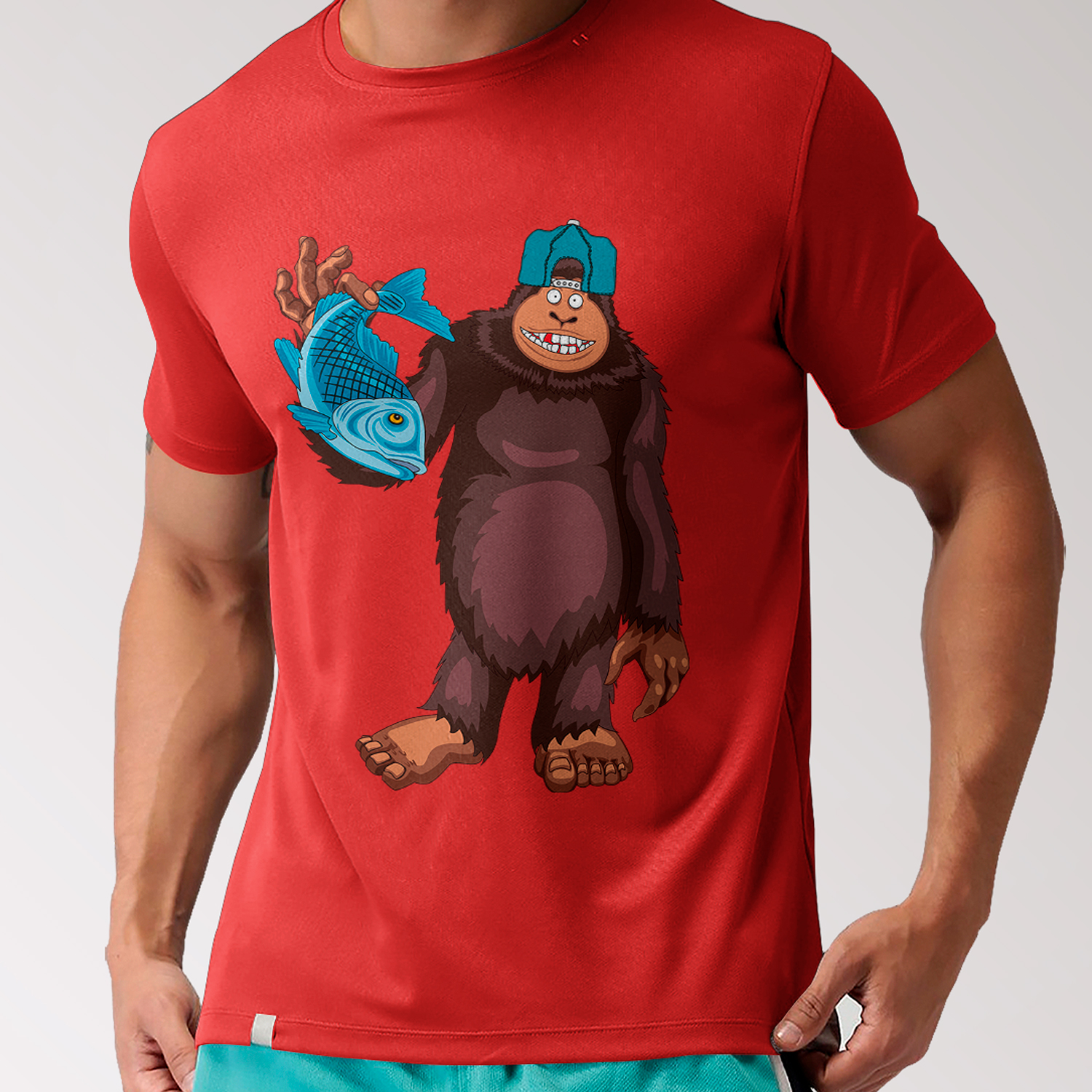 Man wearing a red shirt with a monkey on it.