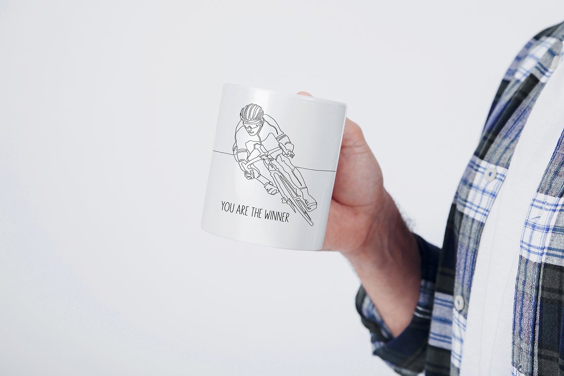 White cup with black lettering and line art cycling illustration.