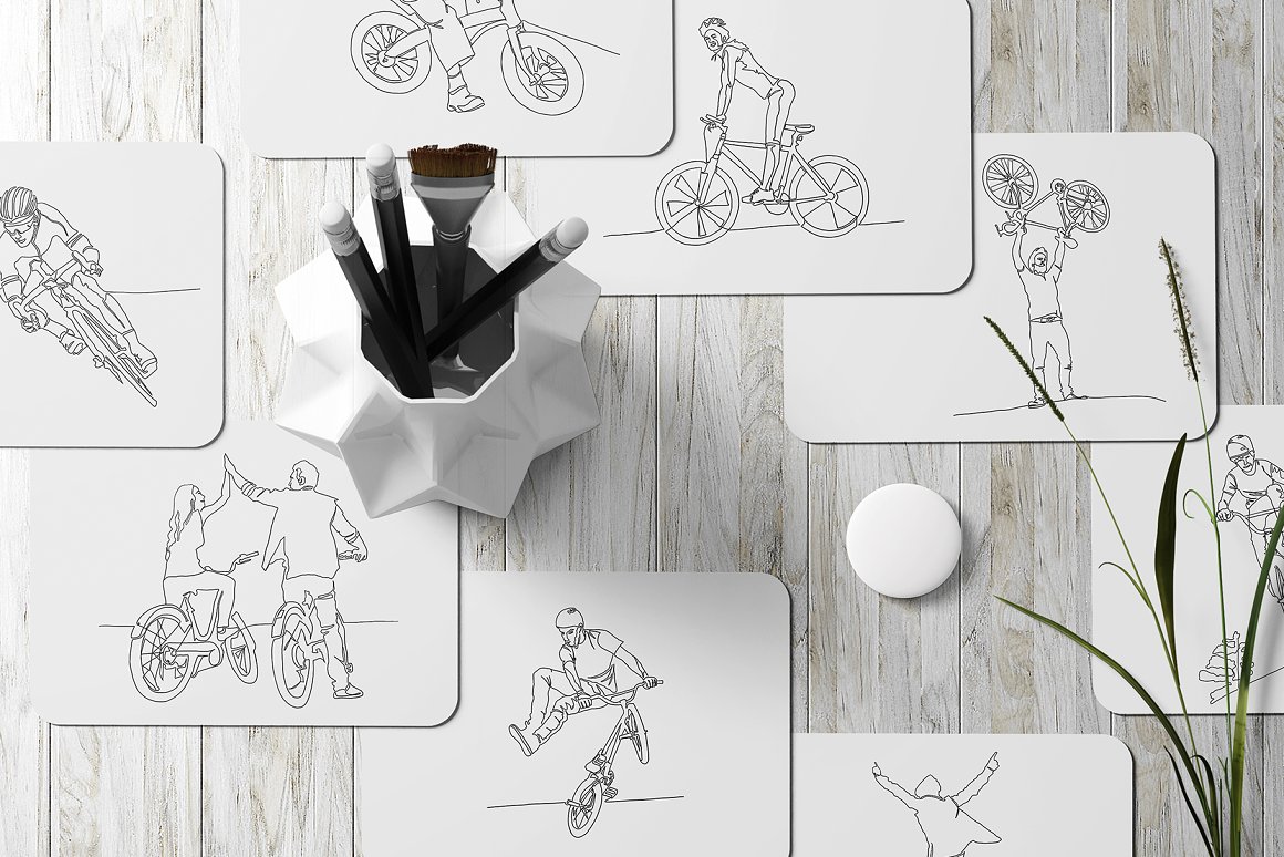 White cards with different line art illustrations of bicycles.