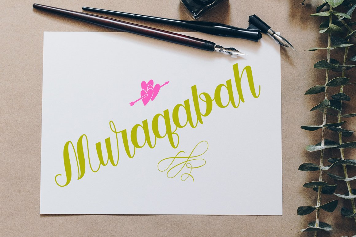 Dirty green calligraphy lettering "Muragabah" on a white sheet with pink hearts.