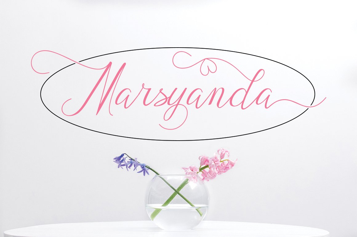 Pink lettering "Marsyanda" in calligraphy font.