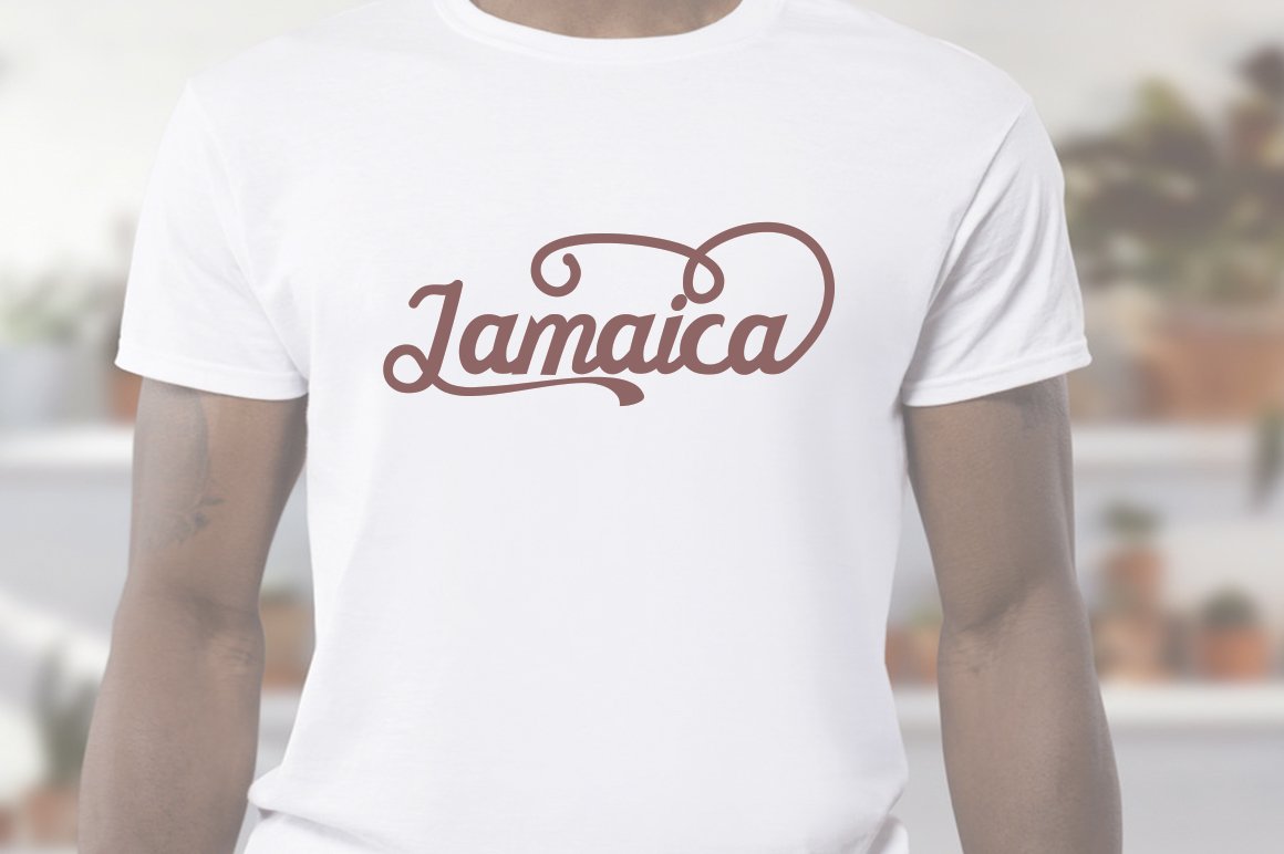 White t-shirt with gray calligraphy lettering "Jamaica".