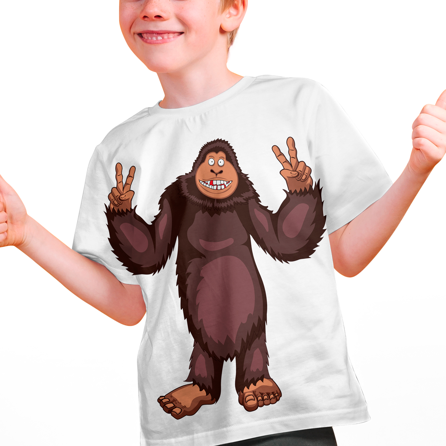 Young boy wearing a t - shirt with a cartoon gorilla on it.