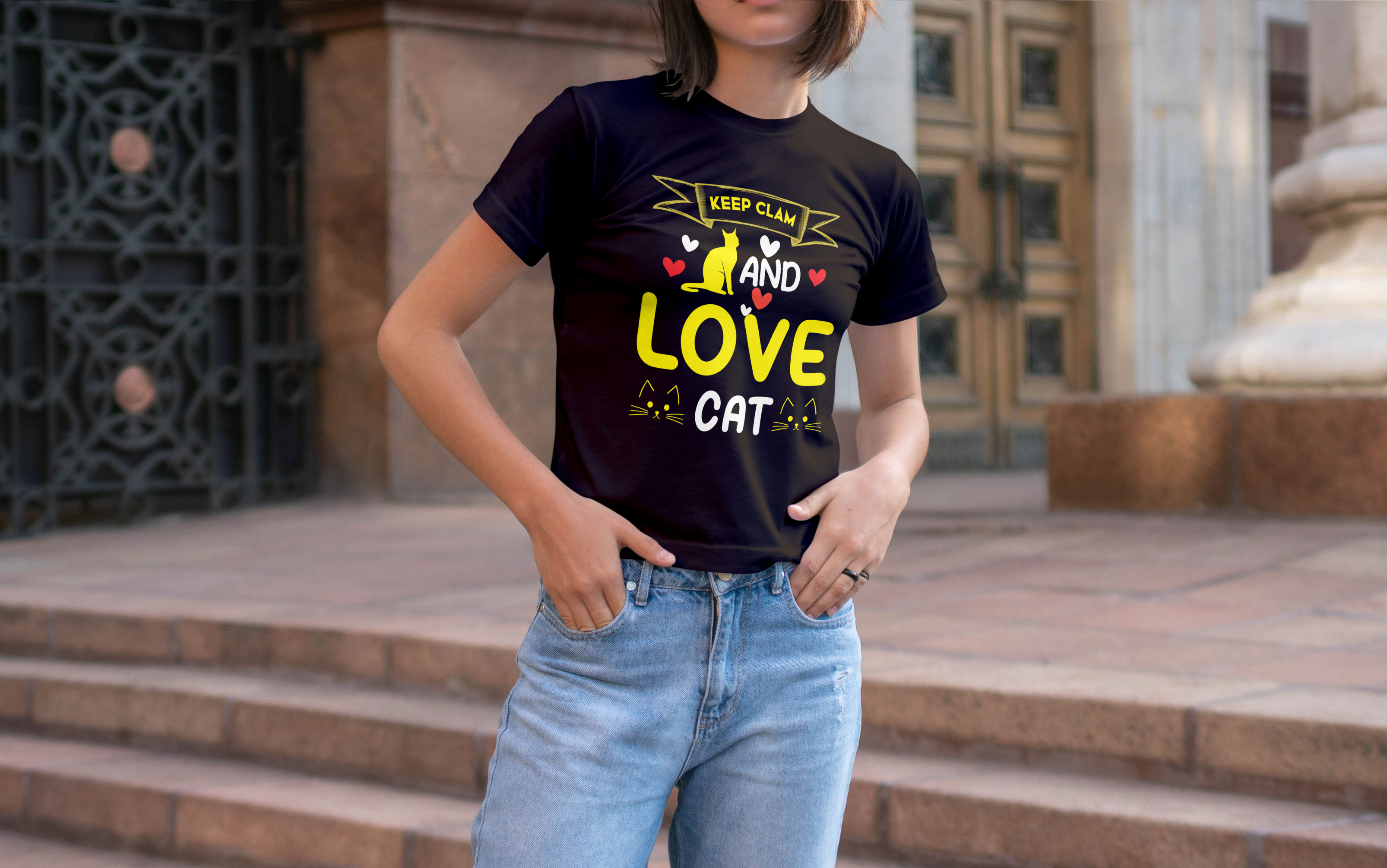 Image of a black t-shirt with exquisite print with a cat