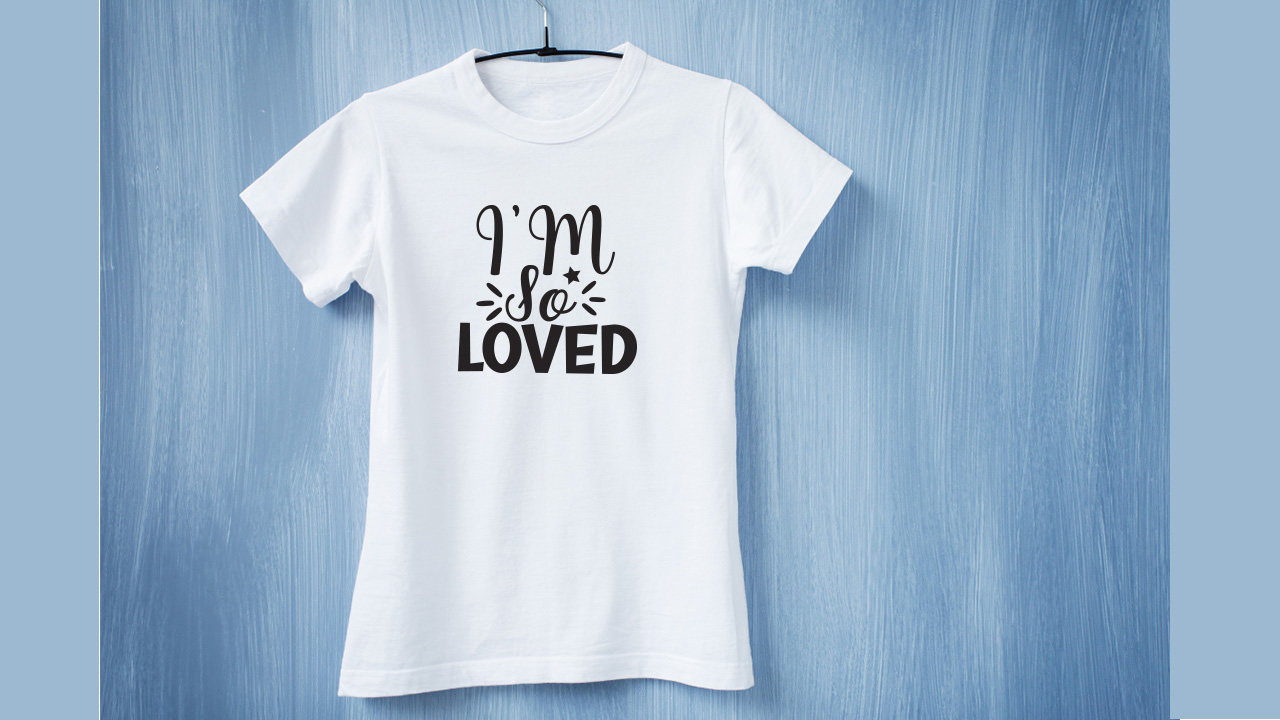 Cute love lettering on a white t-shirt.