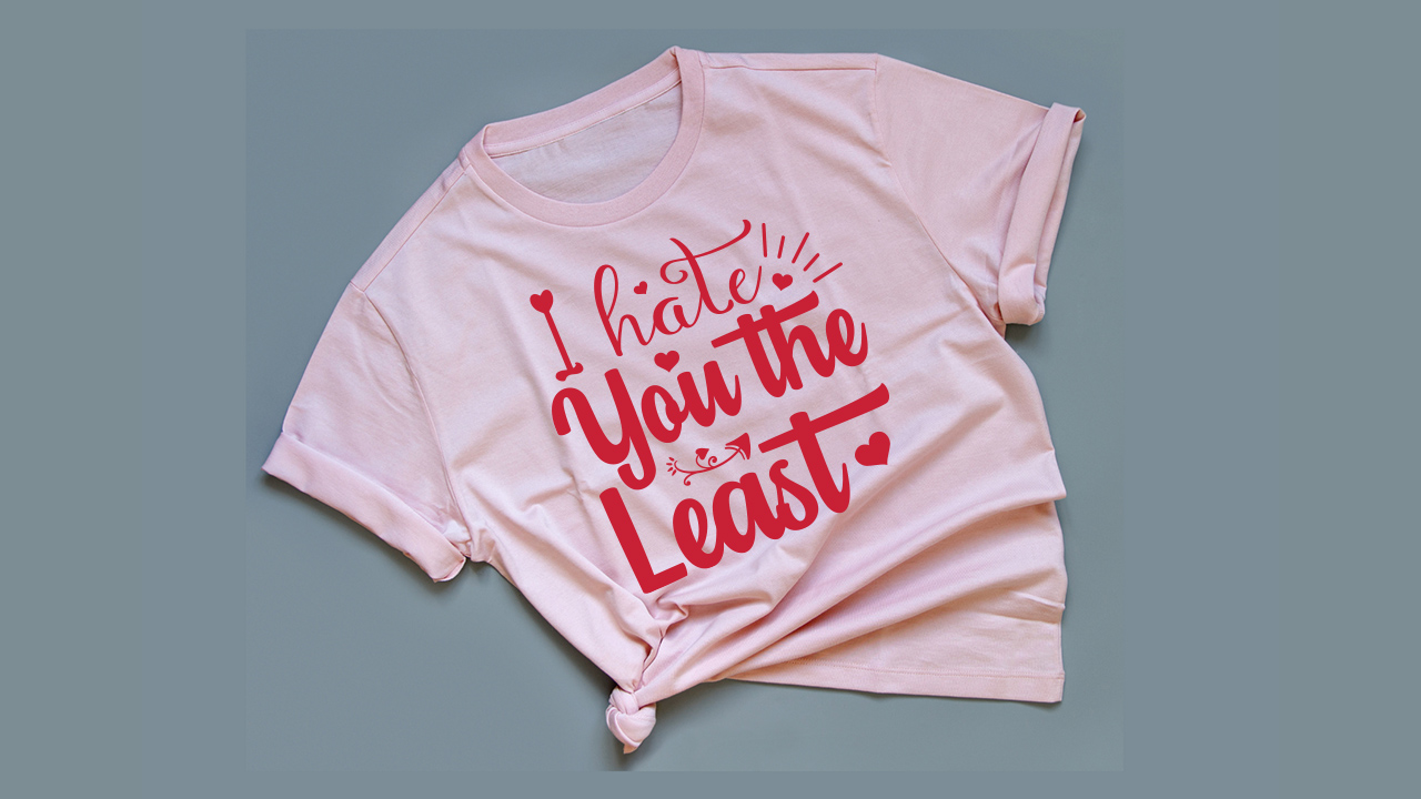 Light pink t-shirt with a red lettering.