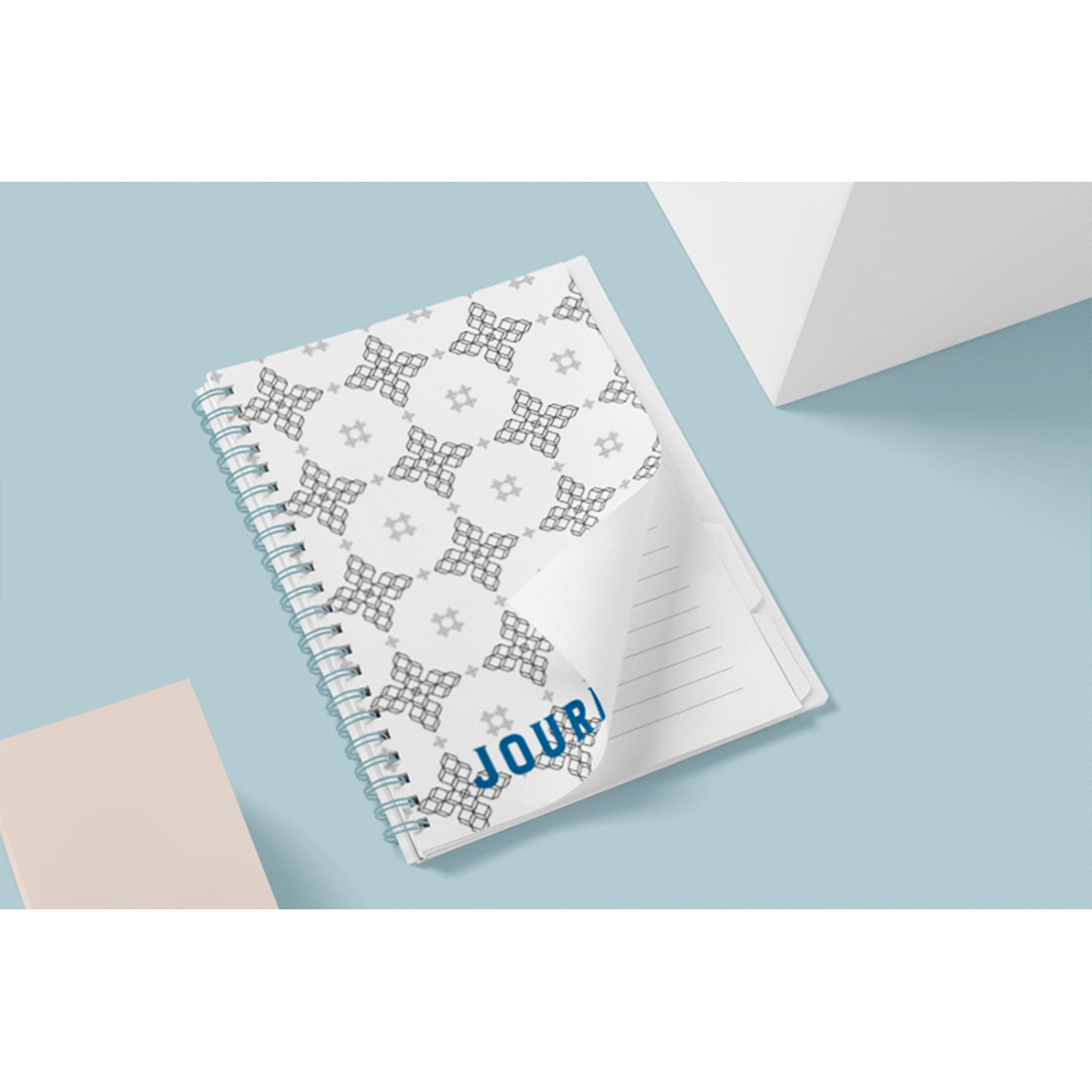 Picture of a notebook with an adorable cover with geometric patterns