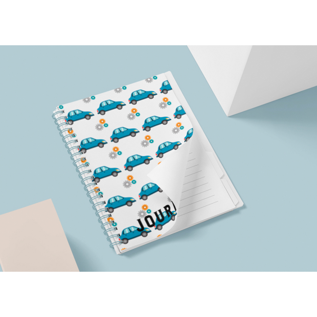 Blue cars on a notebook cover.