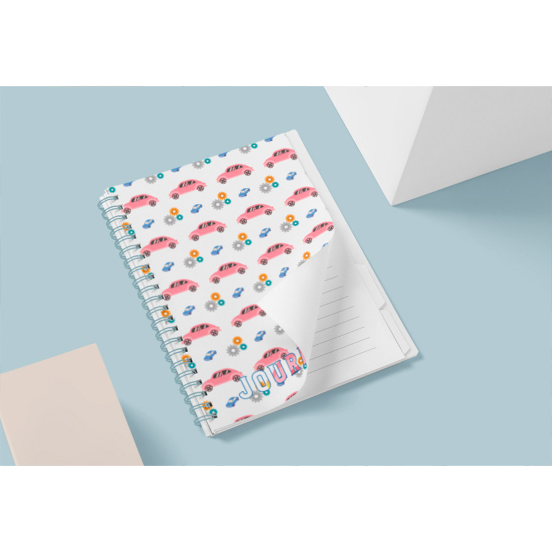 Delicate light notebook with cute cars on a cover.