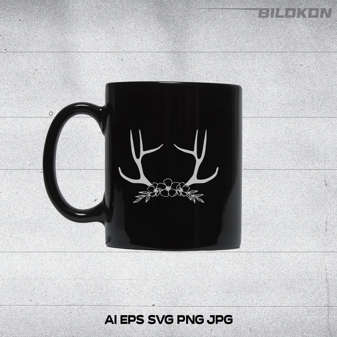 Black coffee mug with white deer antlers on it.