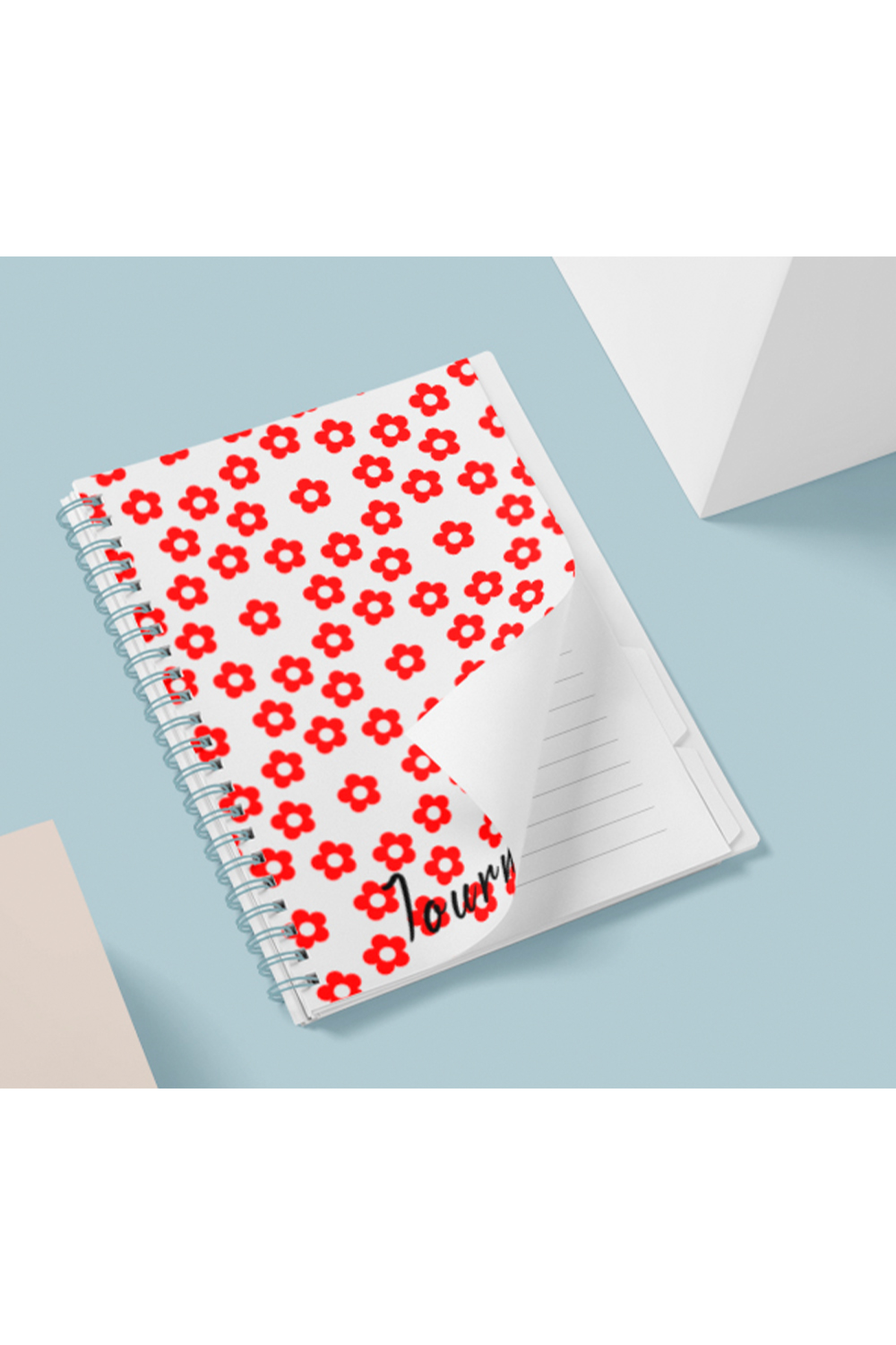 Image of a notebook with an irresistible floral cover design