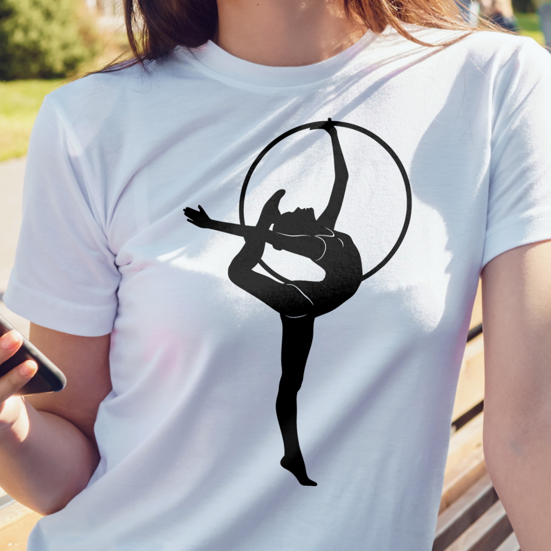 White t-shirt with a gymnast.