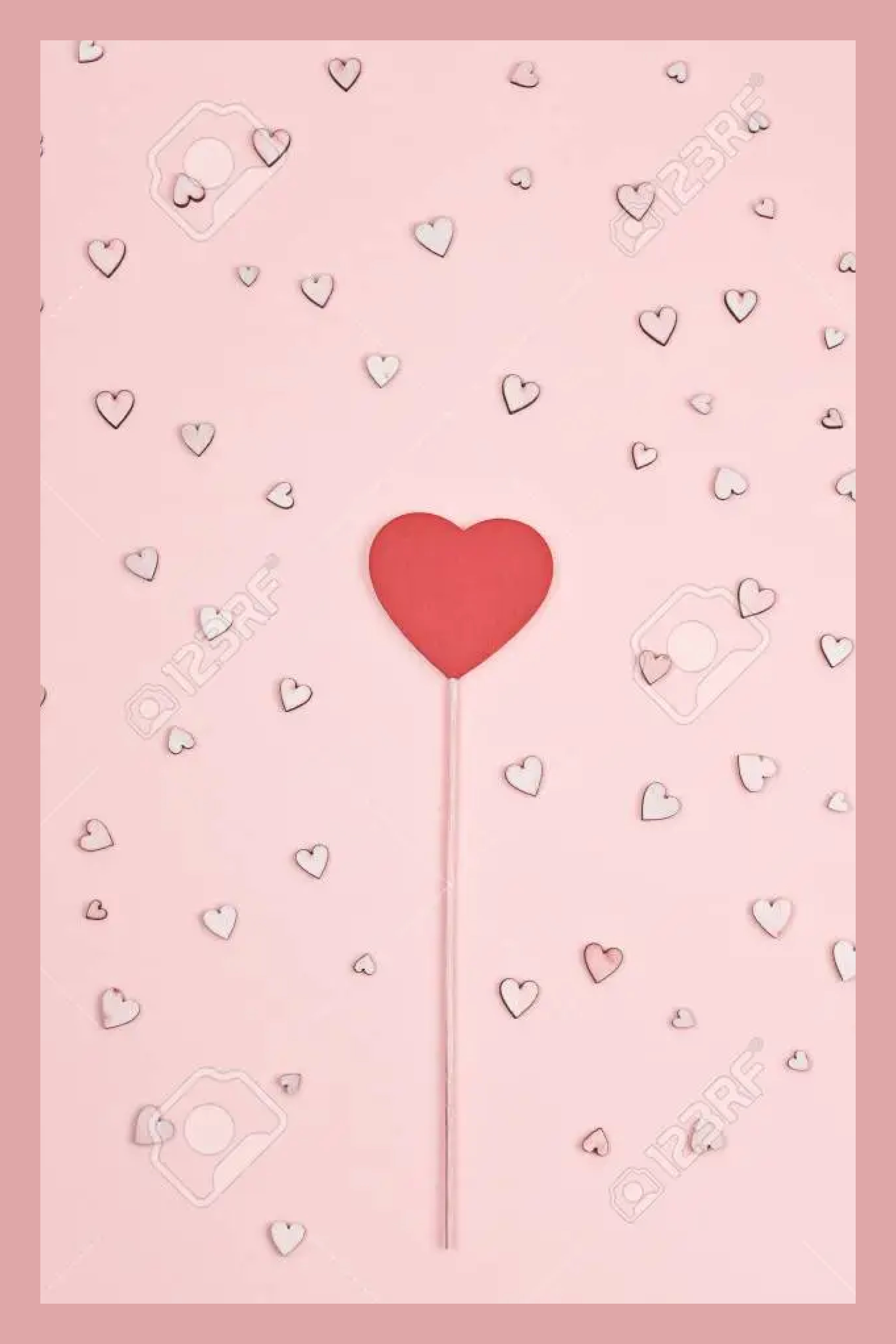 Many little hearts on tender pink backgrounds.