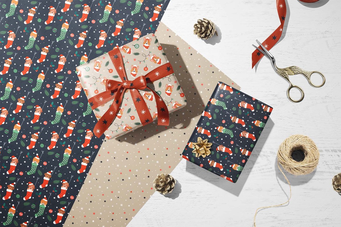 2 boxes in christmas wrapping paper on a gray background.