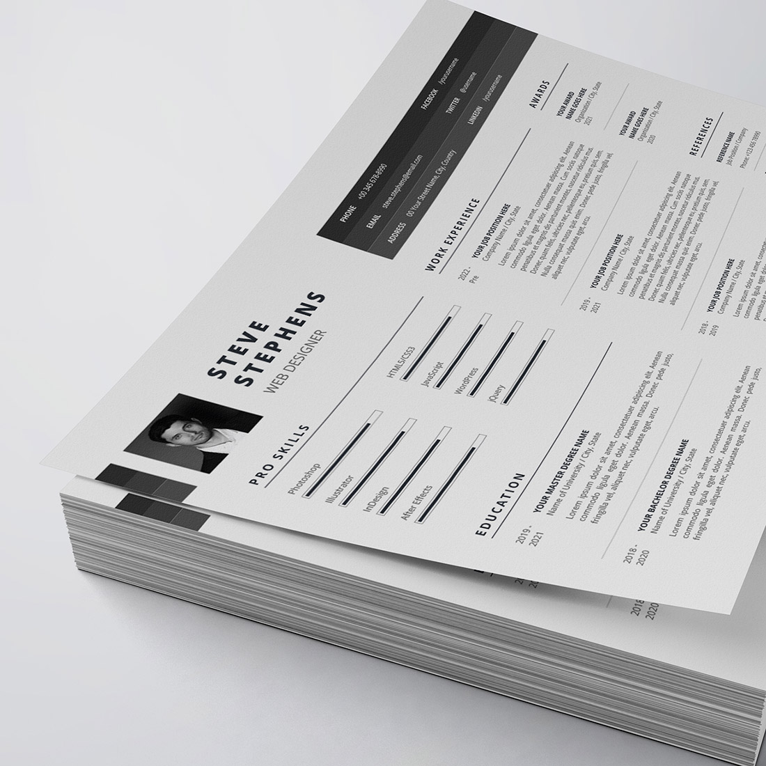 Two pages of a resume on top of each other.