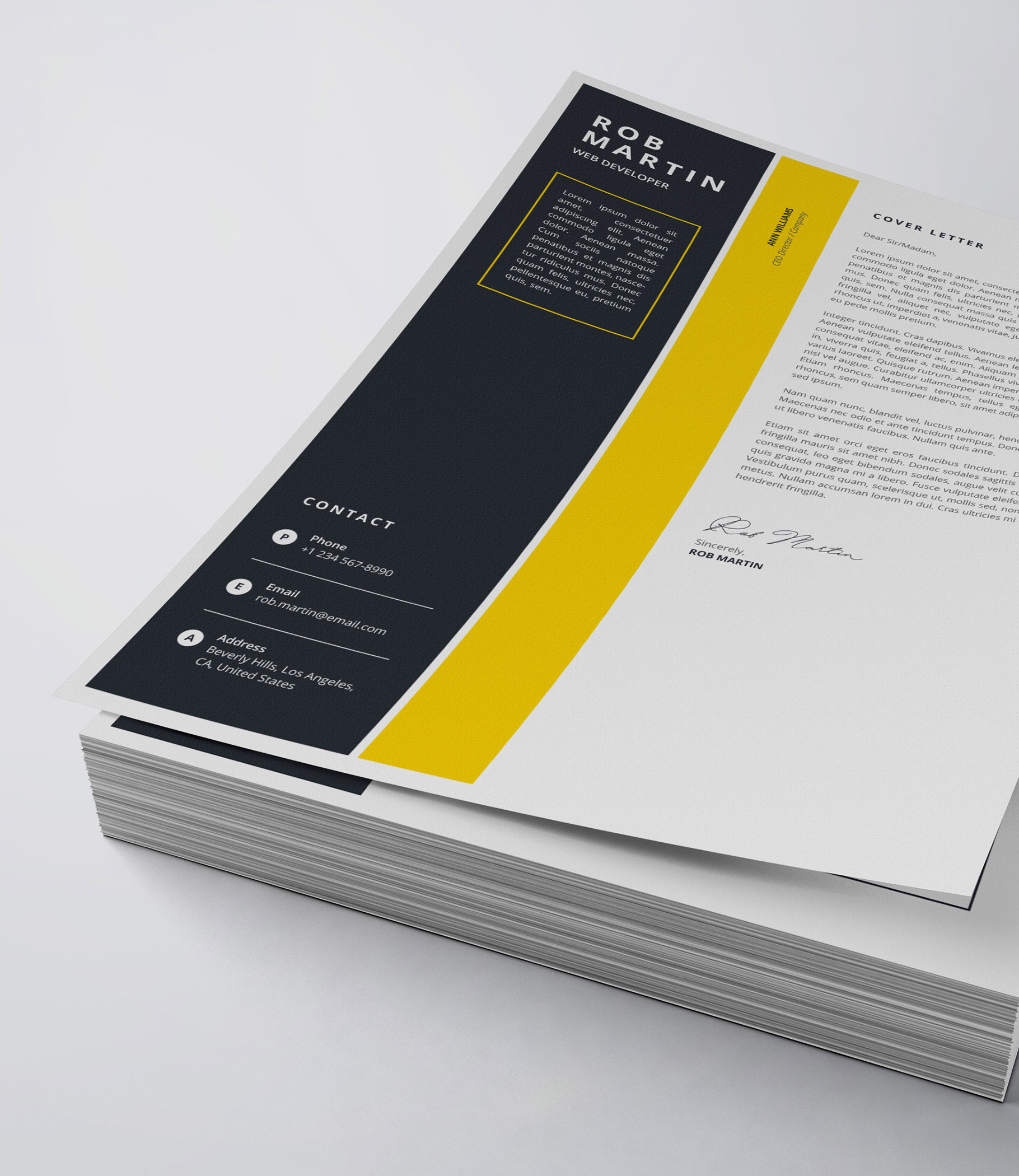 Black and yellow business letterhead on top of a stack of papers.