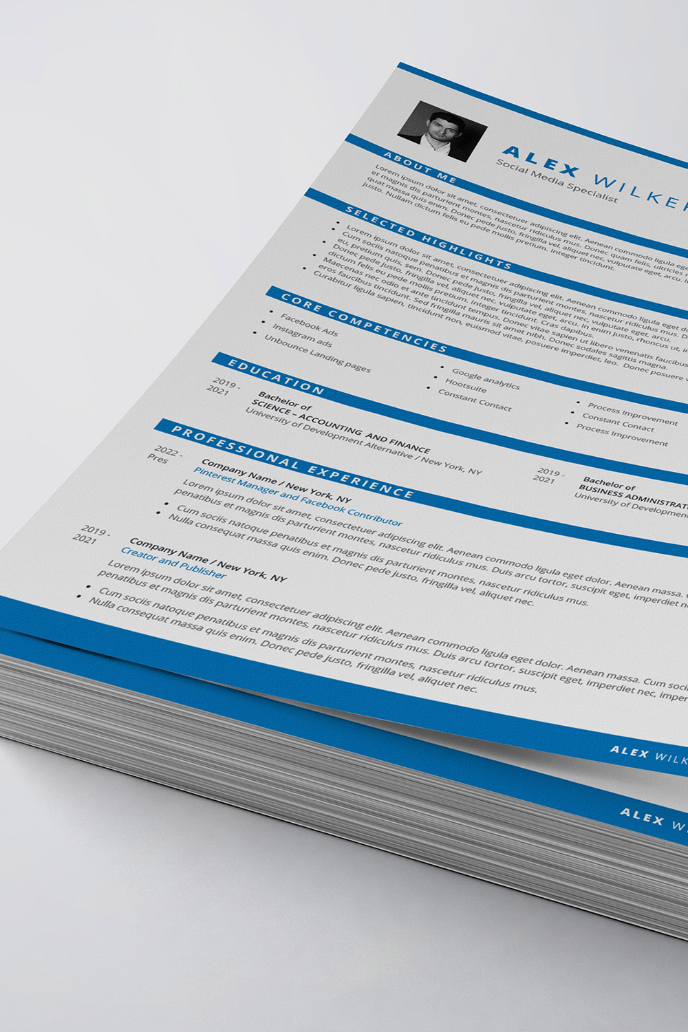 Blue and white resume is stacked on top of each other.