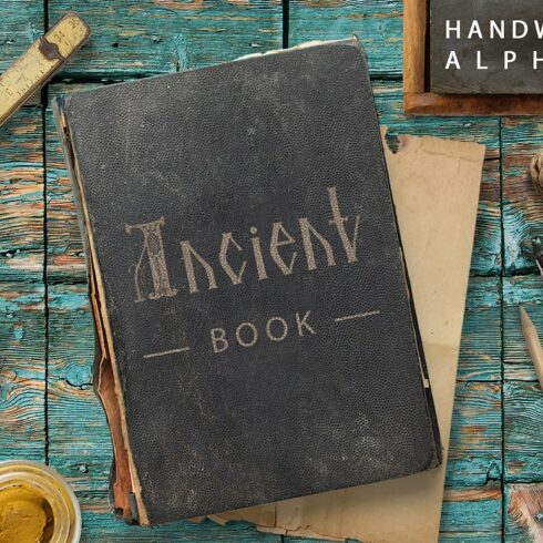 Initials ANCIENT BOOK. Character set cover image.