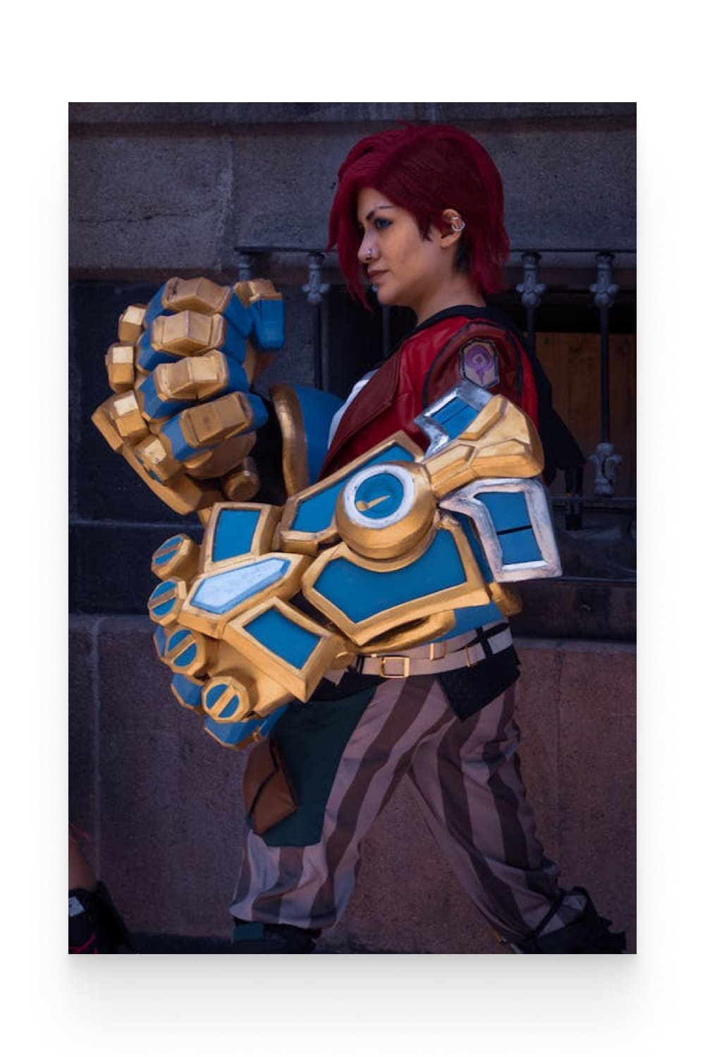 A Woman Doing Cosplay with big arms.