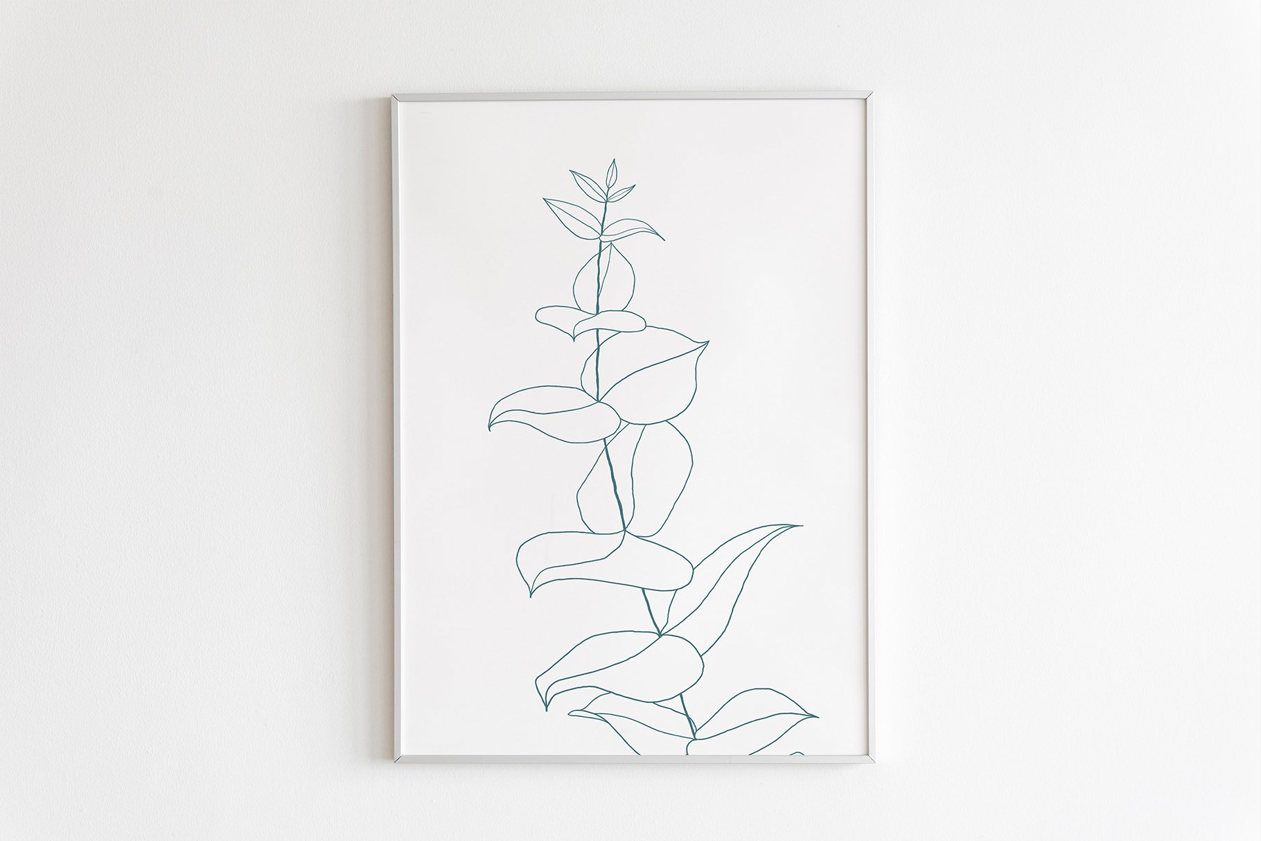 Drawing of a plant on a white wall.