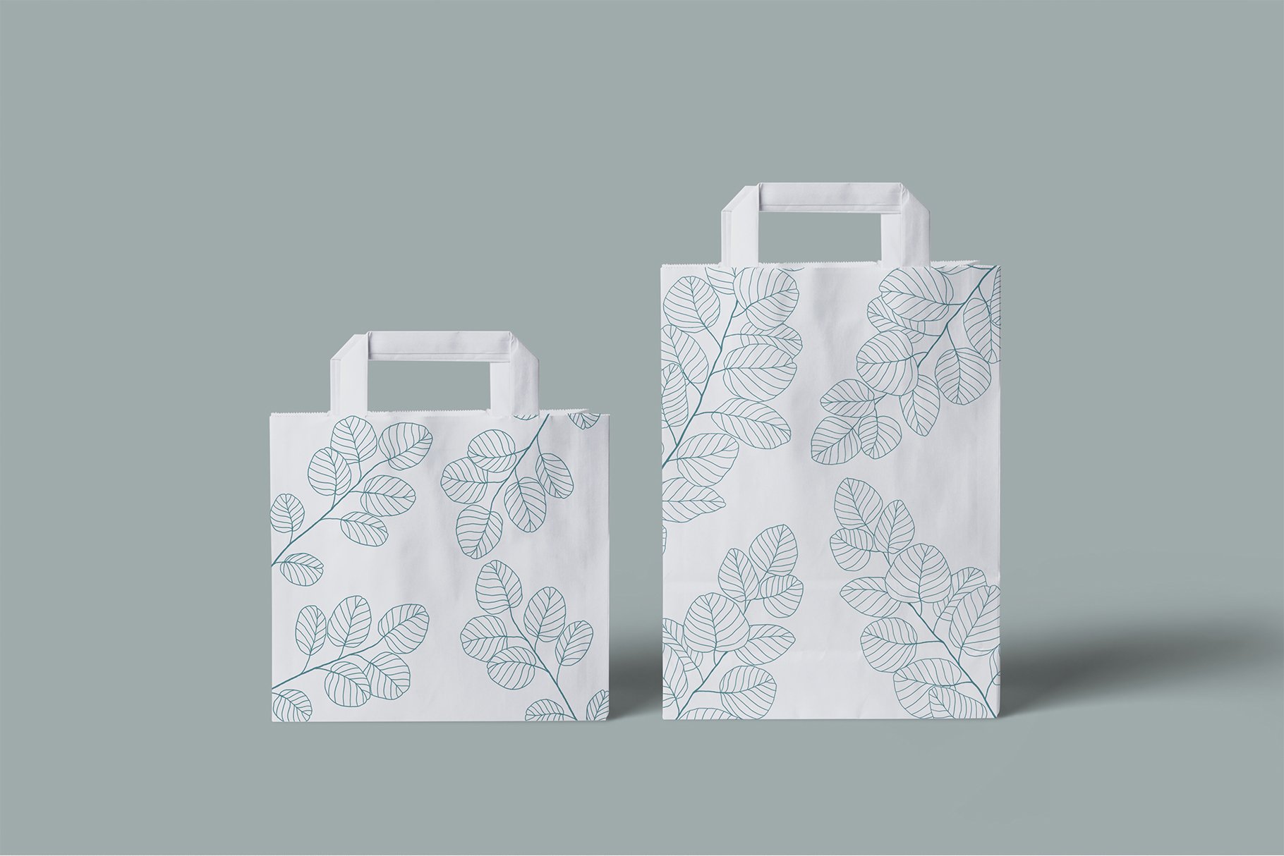 White bag with a leaf pattern on it.