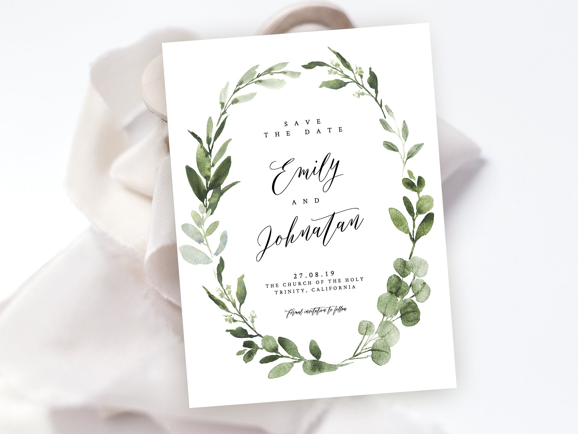 Wedding save the date card with greenery.