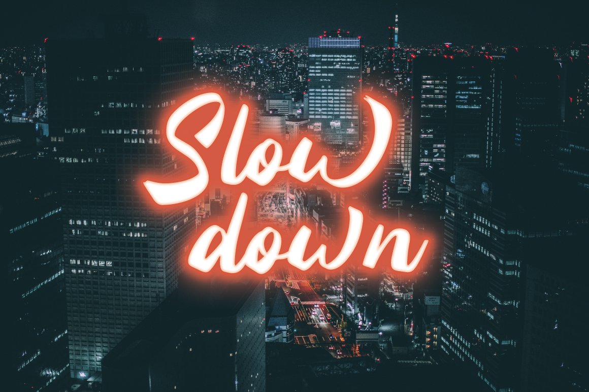 2 slow down neon with night cityscape background 907