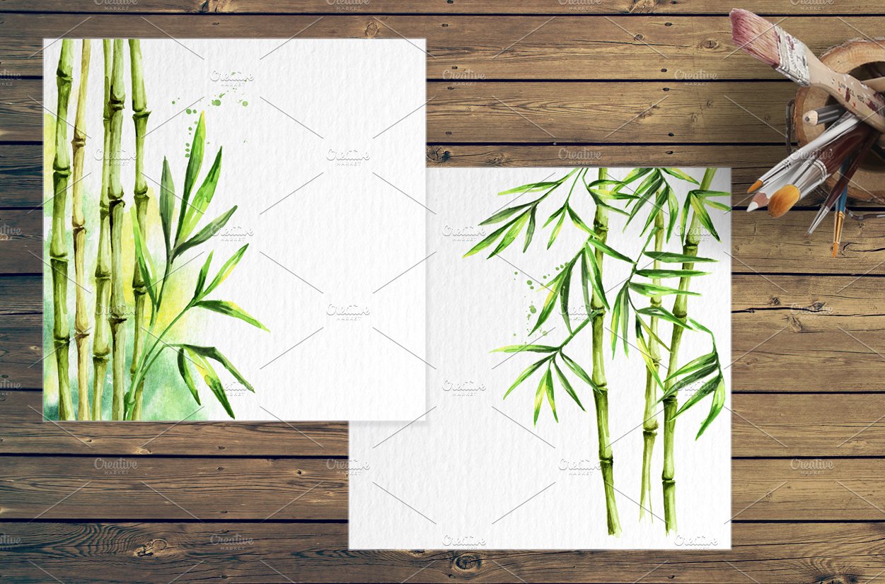 Two paintings of bamboo on a wooden table.