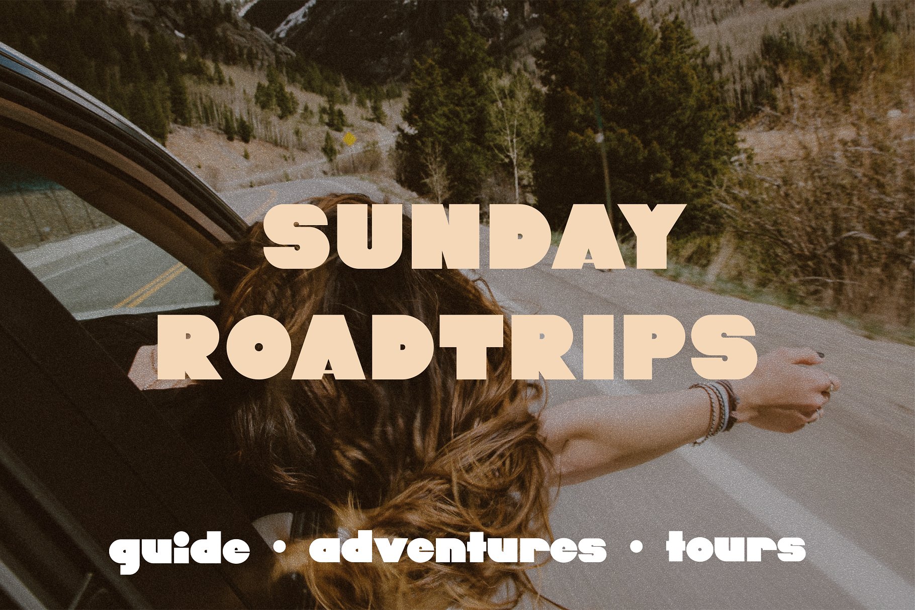 A woman leaning out the window of a car with the words sunday roadtrips.