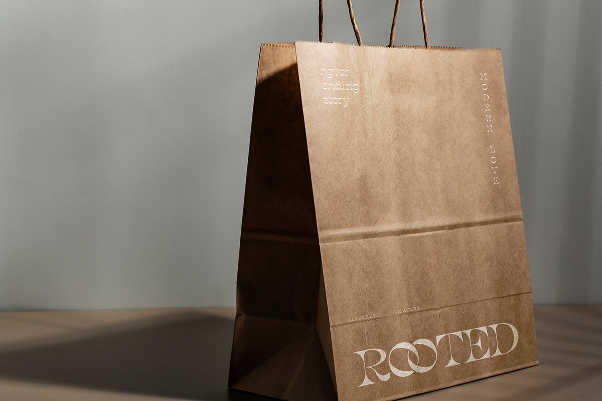 A brown paper bag sitting on top of a table.