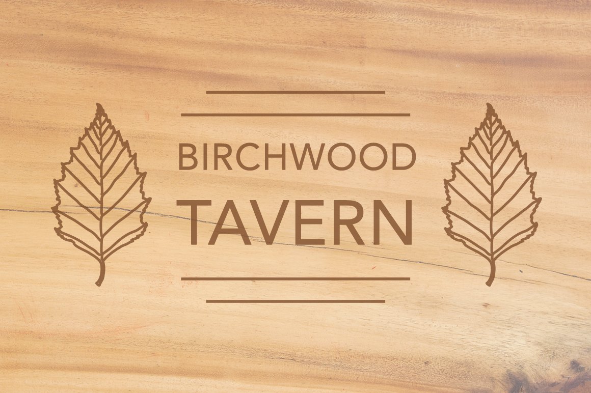 Wooden sign that says birchwood tavern on it.