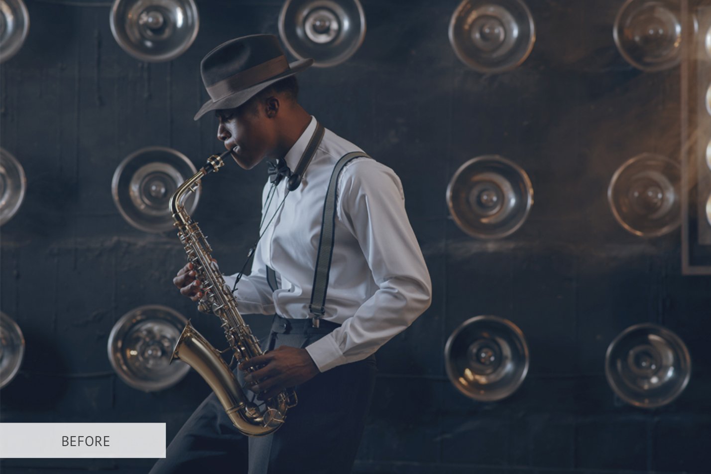 black jazzman in hat plays the saxophone on stage lnhtgd5 147